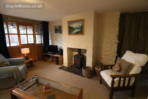 The cosy lounge with log burner