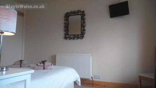 First floor double ensuite with TV (bedroom 4 with room for cot / travel cot)