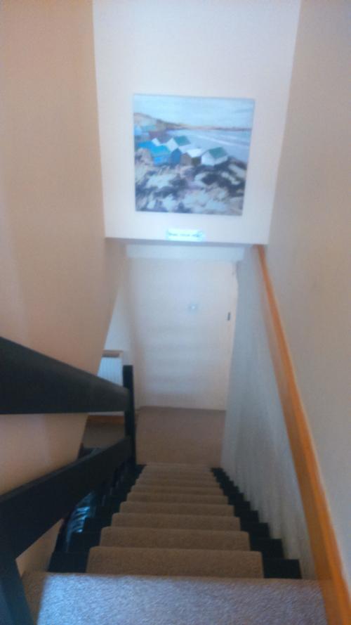 Stairs from first floor to front lounge
