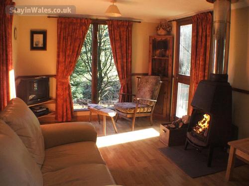 The Lounge with very cosy woodburner