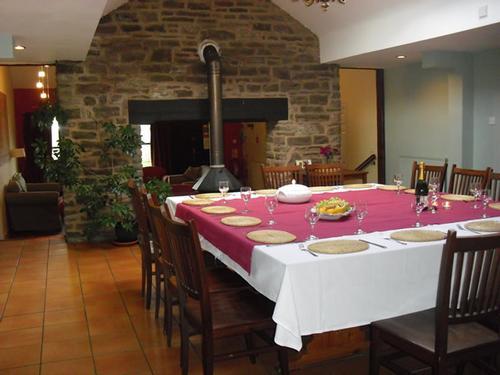 Dining room view with the larger dining table to seat up to 16