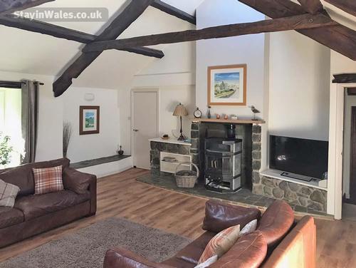 The lounge with woodburner