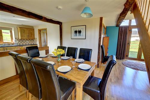 The dining area easily seats 8 guests.