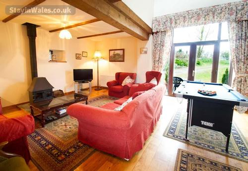 The living room, with French doors opening onto the garden