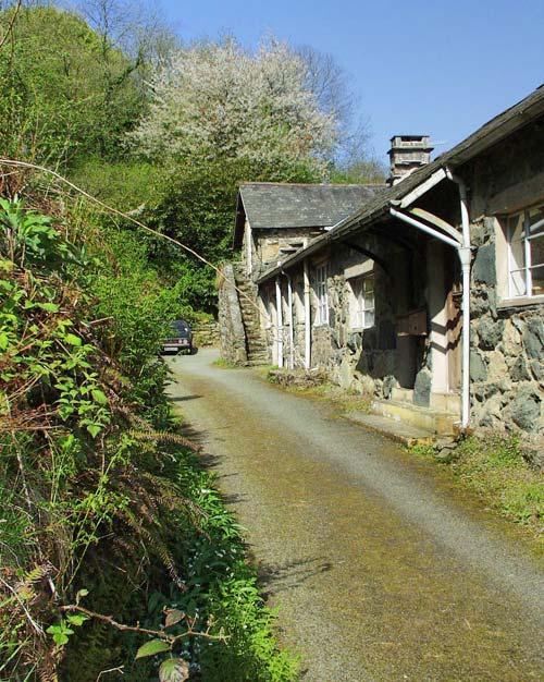 The Mews cottage starts at the porch and joins to Ty Clyd at the end
