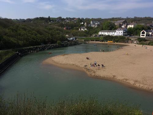 The dog friendly sandy beach and short walk to the Ship Inn