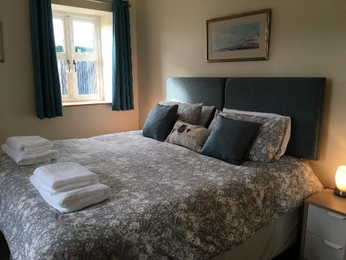 Bedroom 1. Downstairs bedroom sleeps 2 in twin or double bed.