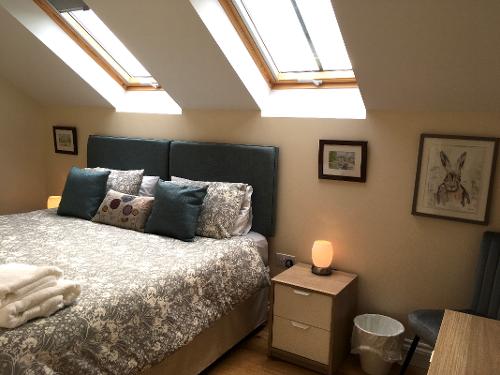 Bedroom 3. Upstairs bedroom sleeps 2 in twin or double bed.