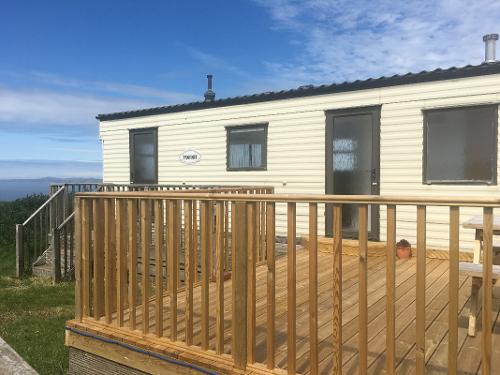 Large decked area with picnic table
