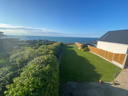 Private enclosed rear garden overlooking the sea