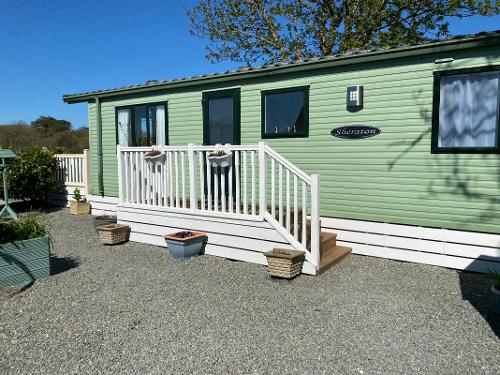 Gated - with barbecue and small shed